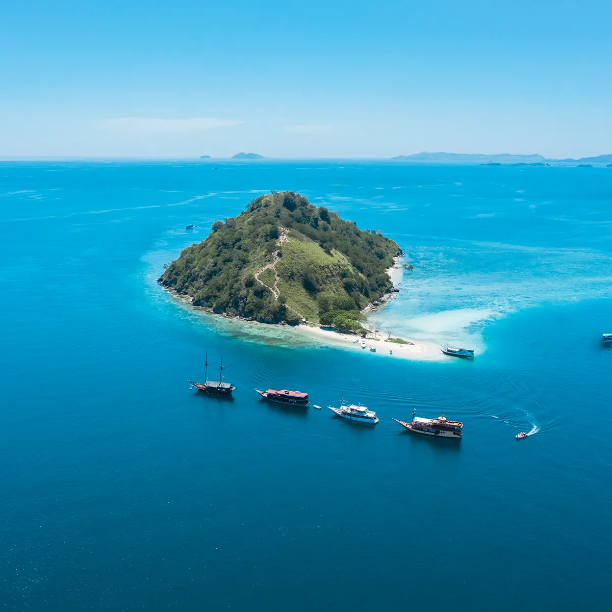 Marina berths from the air, motor yachts alongside the pontoons