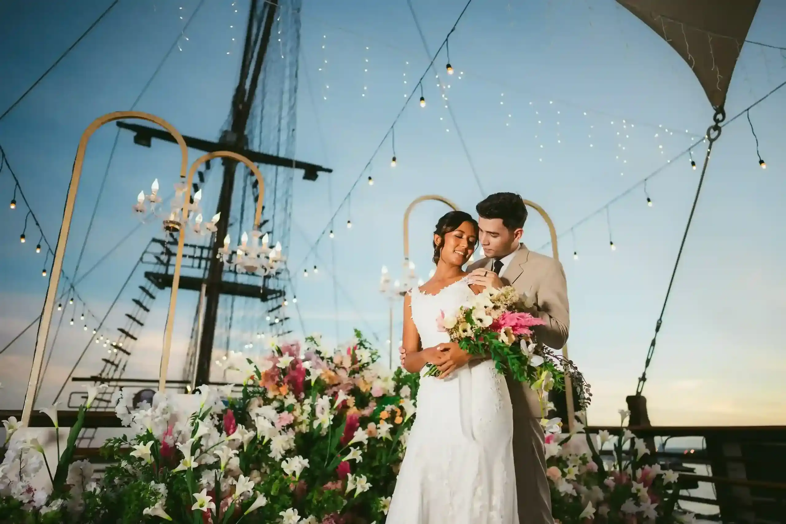 Ceremony staged on deck at golden hour
